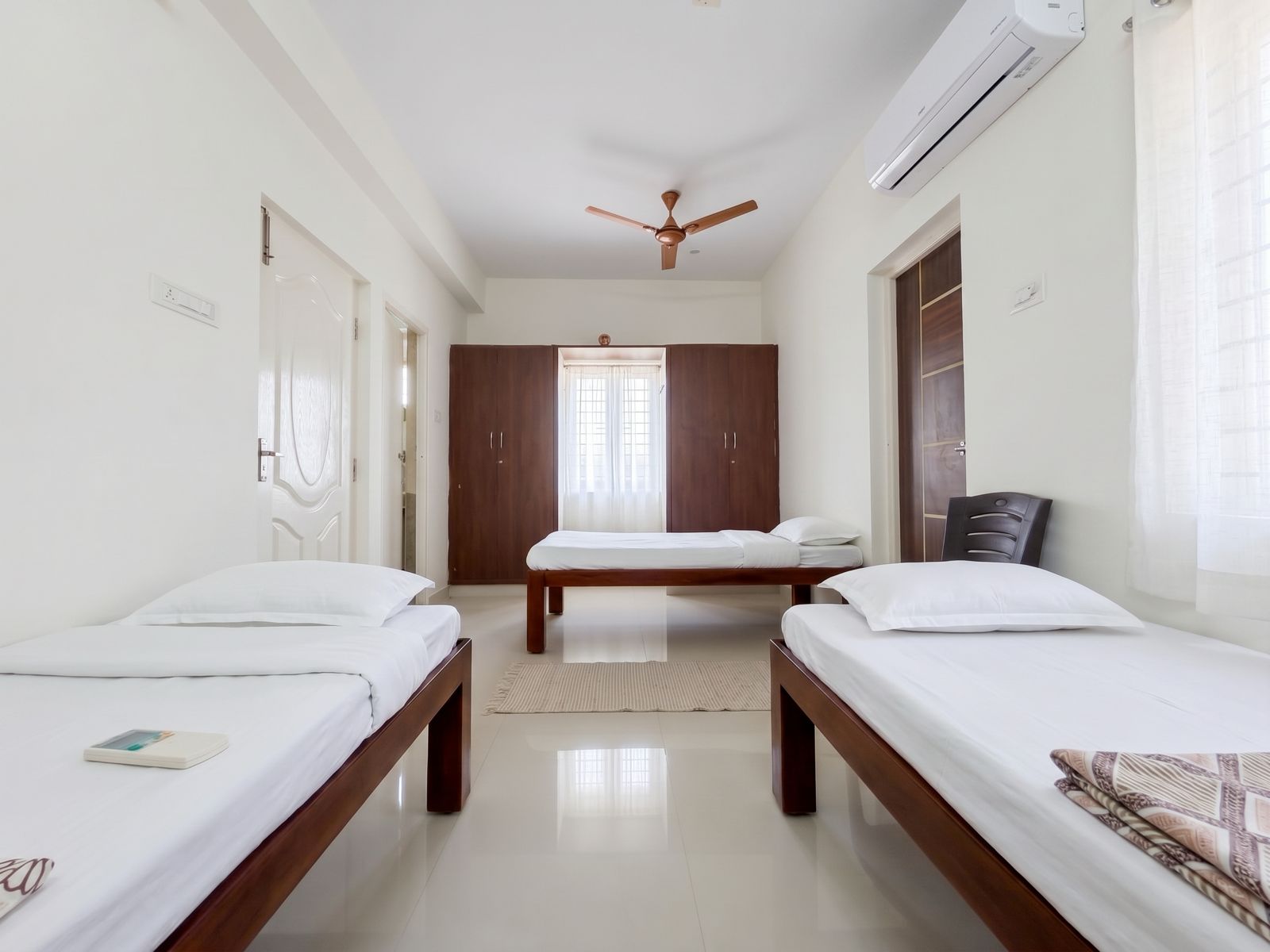 Joe Castle triple occupancy bedroom with AC and wardrobe